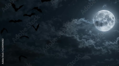 Full Moon and Bats in Cloudy Night Sky - A full moon shines brightly behind dark, drifting clouds, while silhouettes of bats fly across the sky.