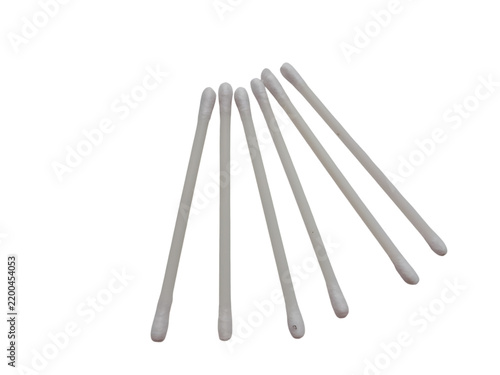 A scattered arrangement of white cotton swabs on a clean white background for hygiene concepts