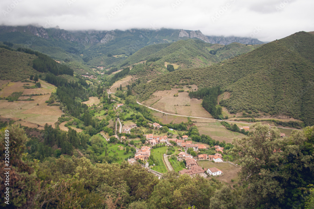 Fototapeta premium Mountain landscape and green valley from San Miguel Viewpoint in Cantabria