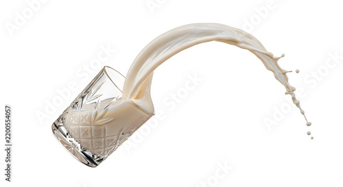 Crystal glass filled with fresh milk splashing out in dynamic motion