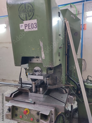 Принти на полотні CNC aluminium profile machining center with metal chips in factory workship