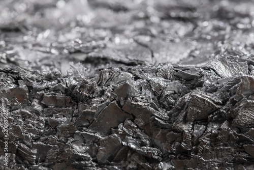 Compressed aluminum scrap, abstract texture, industrial background, recycled non ferrous metal waste associated, raw material for metallurgical industry