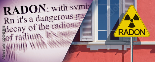 THE DANGER OF RADON GAS IN OUR HOMES - CONCEPT WITH SIGNBOARD AGAINST A RESIDENTIAL BUILDING AND DEFINITION OF DANGEROUS RADON GAS