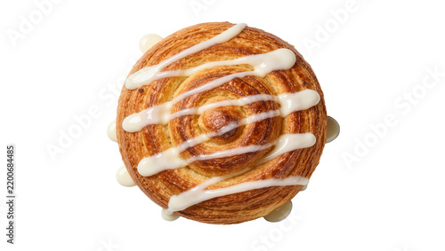 Golden brown swirl pastry with white icing drizzle, isolated on transparent background