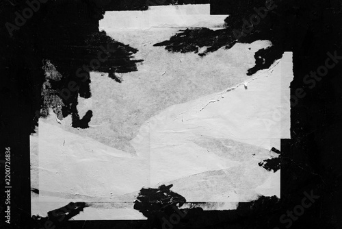 Close-up of torn fragments of an old poster