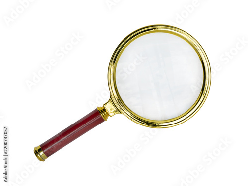 Vintage magnifying glass isolated on a white background.