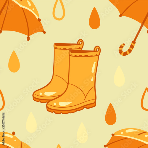 Cute rainy day seamless pattern with yellow rubber boots and open umbrella on green background