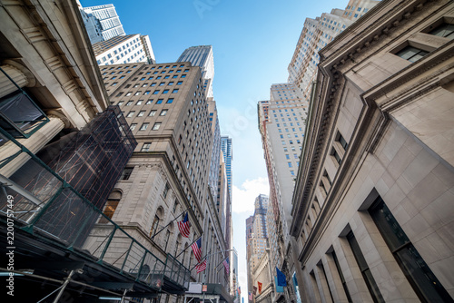 Lower Manhattan skyscrapers viewed from below on a sunny day
