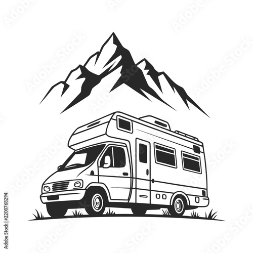 Motorhome parked on grass with mountain peak silhouette during daytime outdoor adventure