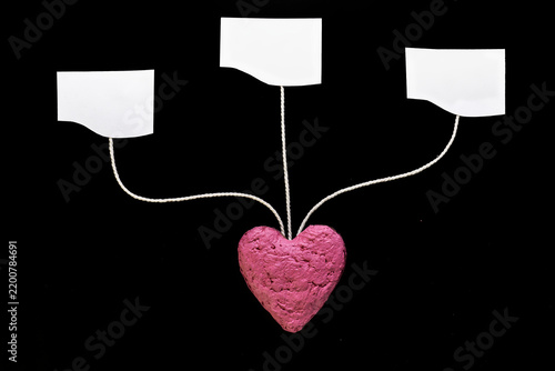 Obraz na płótnie Pink Heart With Three Blank Tags on Black Background Symbolizing Love, Choice, a
