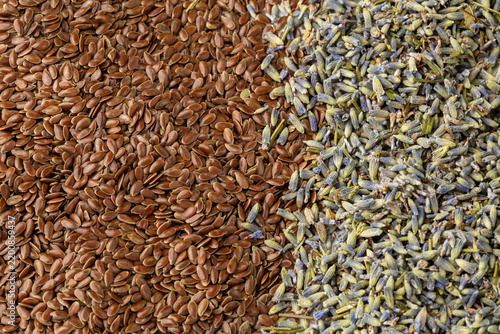 Brown Flax Seeds and Dried Lavender Buds Natural Background