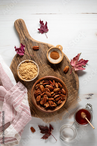 Top down view of ingredients for making caramelized pecans.