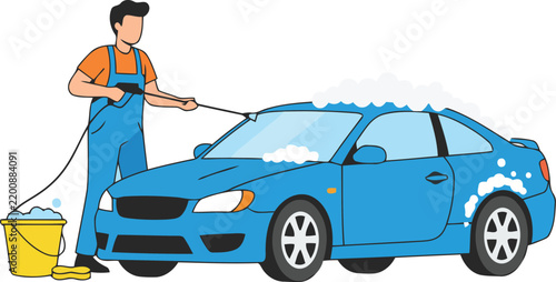 Man in overalls washing a blue car with a hose and soap suds on a light background