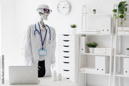 Human skeleton model with doctors uniform in medical office