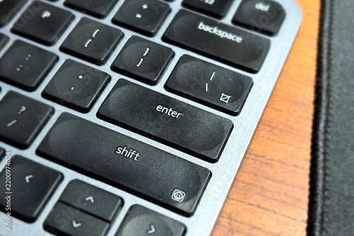 Fotografie Close up of the enter key on a modern computer keyboard