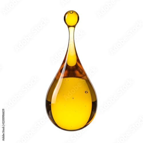 Single golden drop of organic cooking oil isolated on white