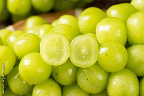 closeup of seedless green Shine Muscat grape background