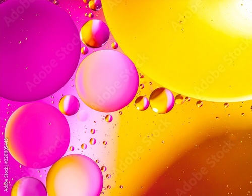 Vibrant oil drops on water macro background
