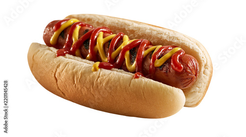 Grilled hot dog in a soft bun topped with yellow mustard and red ketchup drizzle