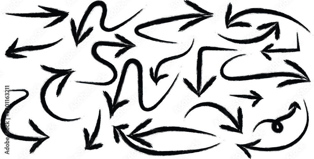 Obraz premium Collection of hand drawn black ink arrows isolated on a white background for design elements