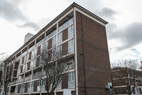 Photography Council housing blocks on Rockingham estate in Southwark, London, UK against a c
