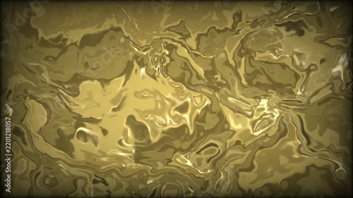 Golden liquid swirls and flows across a dark reflective surface in a continuous motion swirling flowing