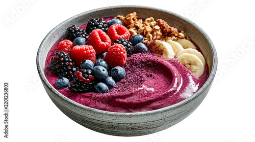 Acai berry smoothie bowl topped with fresh raspberries blueberries blackberries and granola