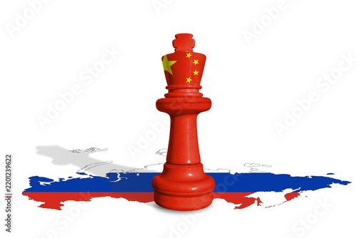Chess made from flag of China on a map of Russia