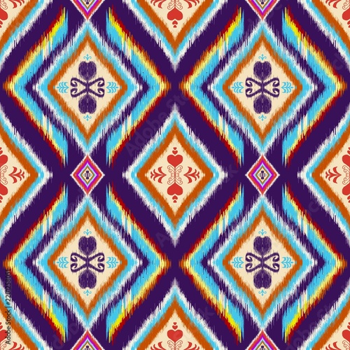 Illustration of a purple abstract geometric ikat pattern.