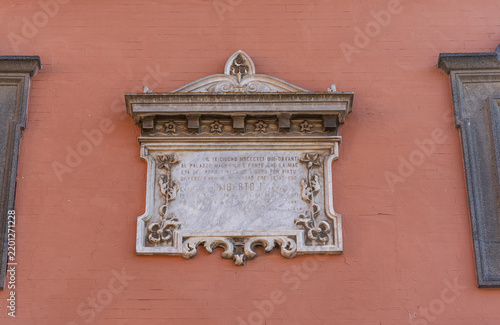 Fotografie Marble commemorative plaque on the facade of the Hotel Reale, dedicated to Umber