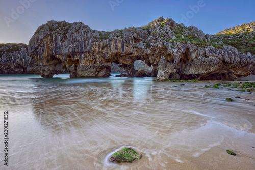 Playa Cuevas del Mar Beach, scenic karst area stated a Natural Monument due to the geological value of its rock formations. Llanes-Asturias-Spain-077