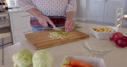 Preparing fresh vegetables on kitchen counter for healthy home-cooked meal