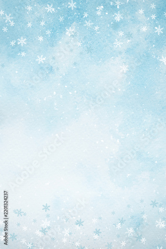 A blue watercolor background with falling snow for designing winter holiday web banners
