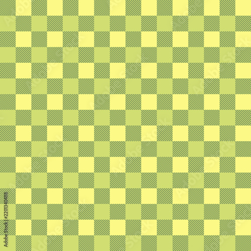Yellow and green checkered gingham pattern with a classic textile texture
