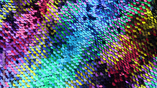 Iridescent sequin fabric texture background, colorful sparkling sequins pattern for glamour party, fashion or festive design