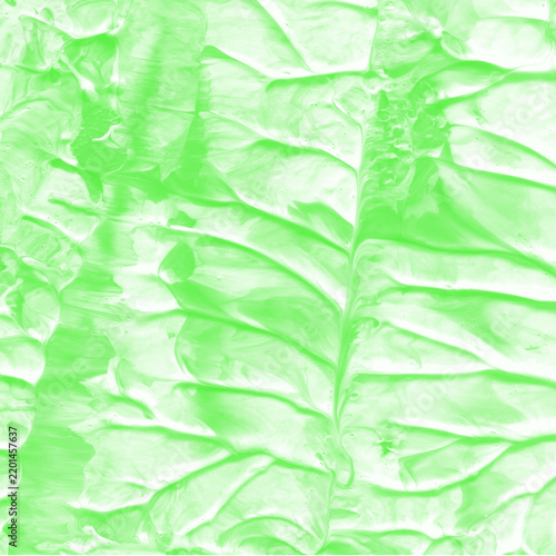 Green painted brush marks and artistic strokes