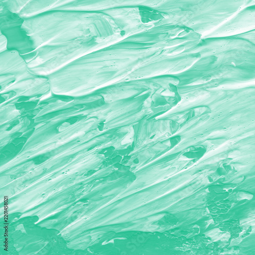 Green painted brush marks and artistic strokes