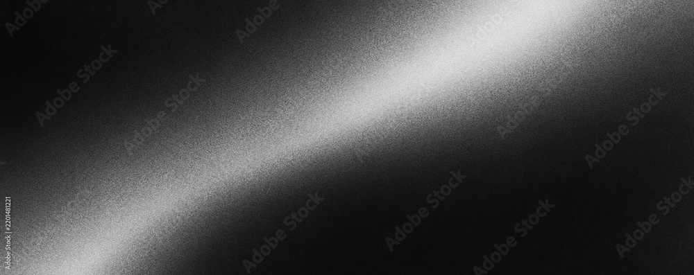 Fototapeta premium Abstract diagonal beam of bright white light on dark textured background