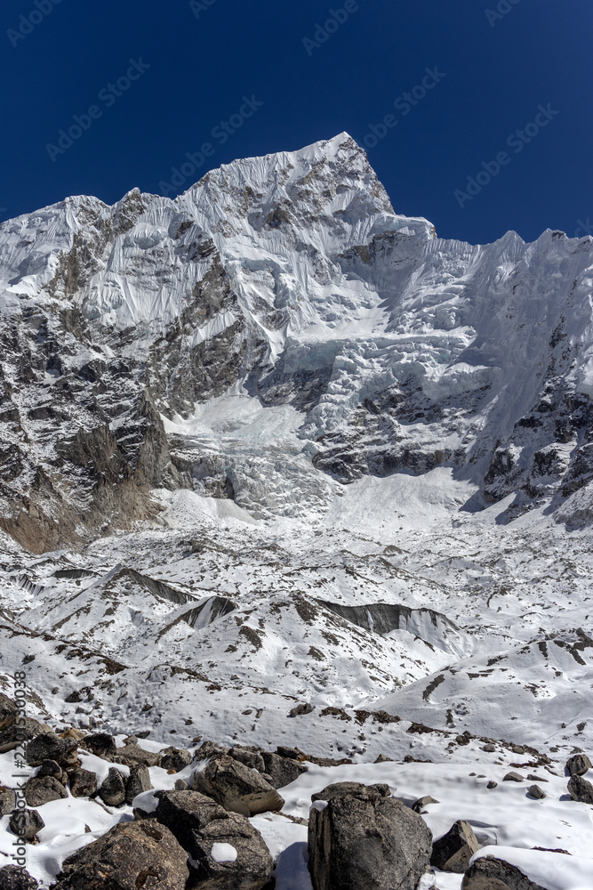 Obraz premium Nuptse South Face and Hanging Glacier Above the Khumbu Moraine Nepal