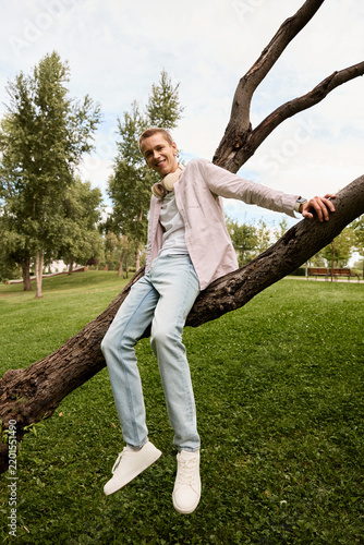 Konstfotografi Young man relaxing in nature, prioritising his mental health while sitting on a