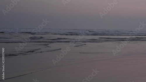 Dramatic Waves Crashing on Parang Tritis Beach at Dusk in Yogyakarta, Indonesia - Serene Coastal Landscape