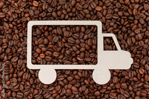 Delivery Truck Mockup with Blank Branding Space for Coffee Delivery Concept Against Coffee Bean Background