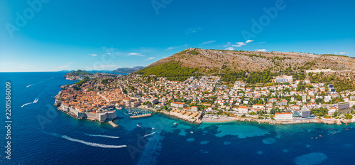 Panoramic aerial view of Dubrovnik Croatia featuring historic Old Town city walls blue Adriatic Sea and coastal hills