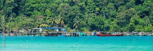 Colorful boat pier at Saracen Bay on the island of Koh Rong Sanloem near Sihanoukville, Cambodia panorama