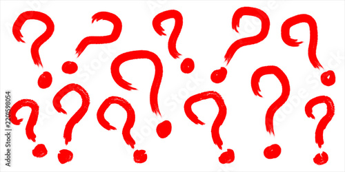 A collection of hand drawn red question marks isolated on a white background for creative design projects