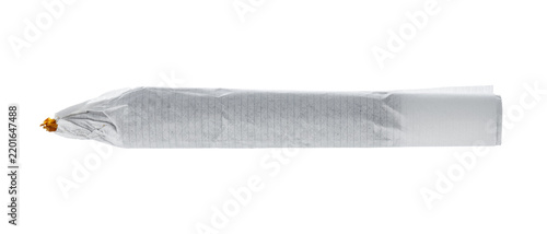 Obraz na płótnie Large pre-rolled joint on a white background