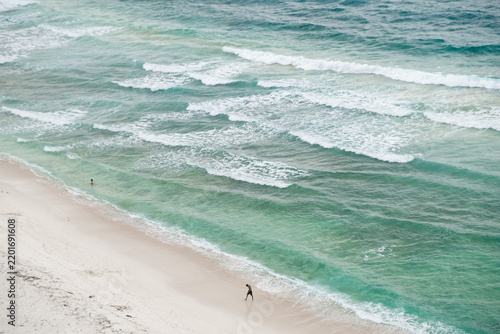 Fotografie Aerial view of Backside Beach (Dolok Oan) with turquoise water near Cristo Rei i