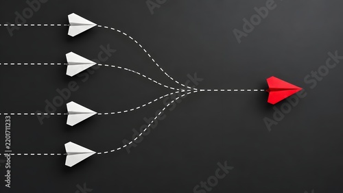 Corporate merger and business consolidation concept with white paper airplanes merging into single red airplane