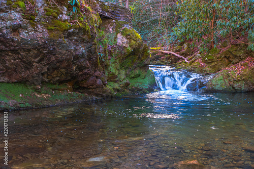 Bild auf Leinwand Soothing cascade meandering through the forest in the Cherokee NF in Tennessee, USA