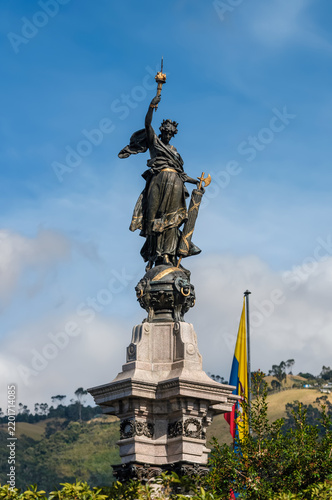 Centenary of Ecuadorian Independence Monument with National Flag under Blue Sky
